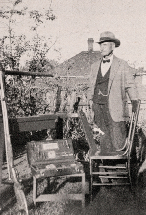 C.W. Rowland at the portable bench with his 32-40 Pope-Ballard rifle and equipment. From Modern Accuracy by Wallack.